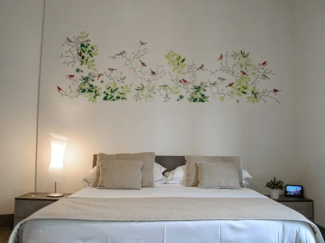 Camera Tripla  ·  charlotte