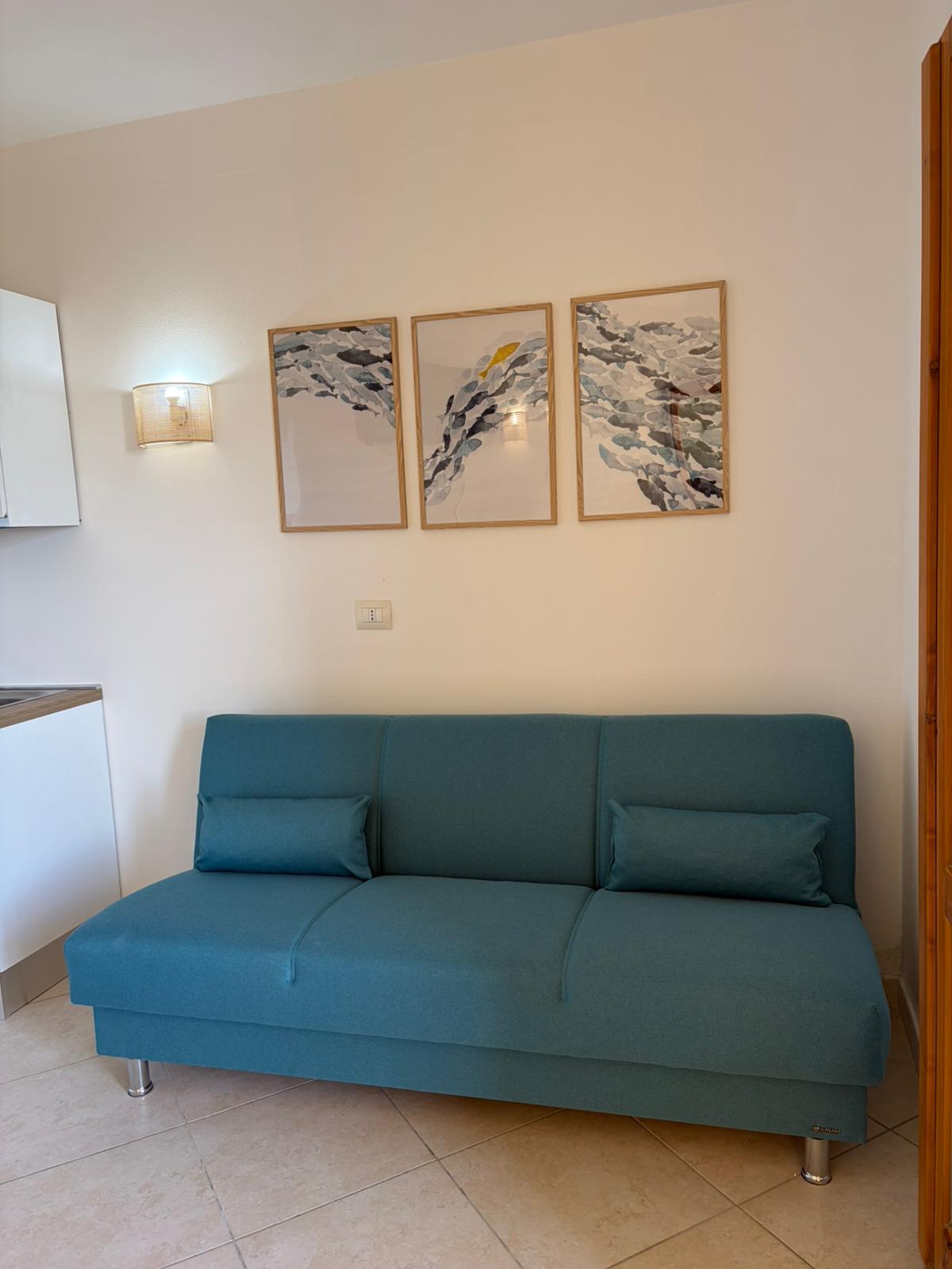 Relaxation area with sofa bed - Tramonto dorato apartment, Montiano (GR)